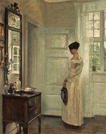Woman in an Interior with a Mirror - Carl Holsøe