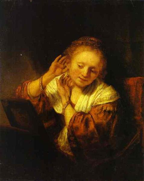 A Young Woman Trying on Earings, 1657 - Rembrandt van Rijn